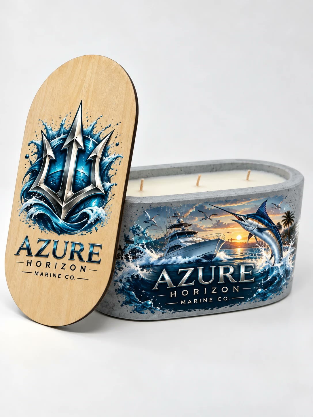 Concrete candle with a marlin and a sport fishing boat at sunset, Azure Horizon Marine Co. on the stone and on the lid leaning beside it.